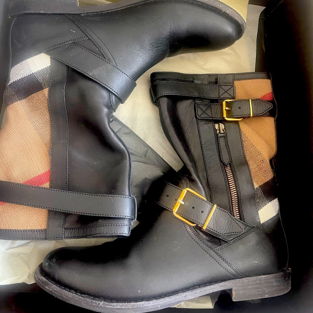 black size 7 1/2 Burberry boots worn a couple times.